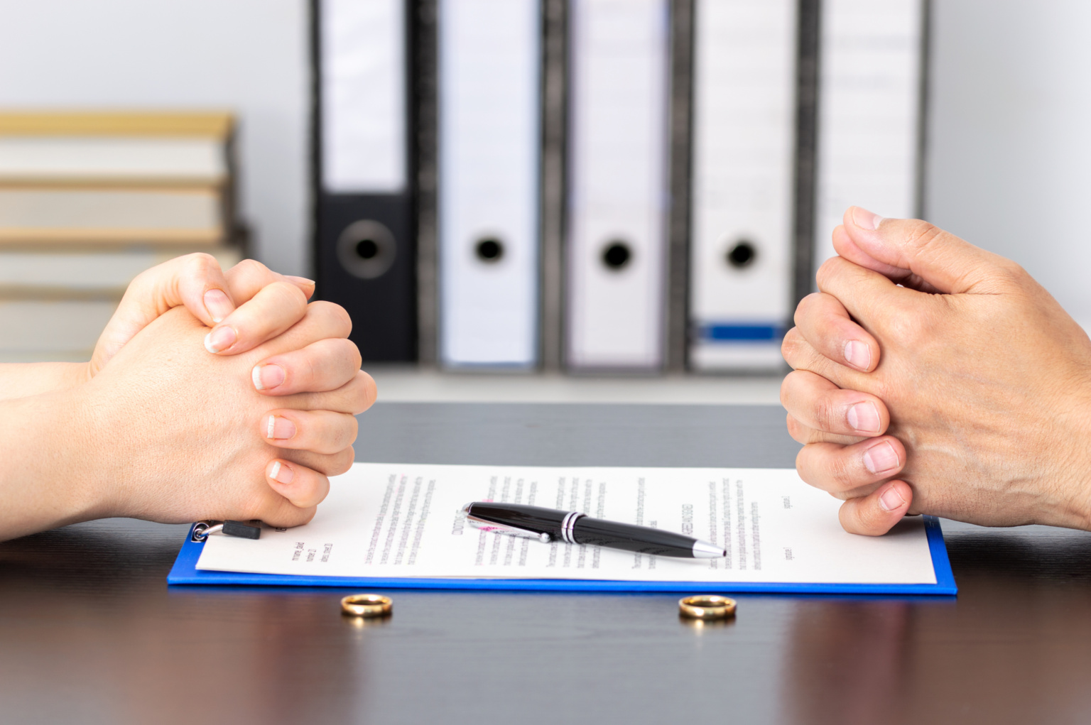 Wife And Husband Signing Divorce